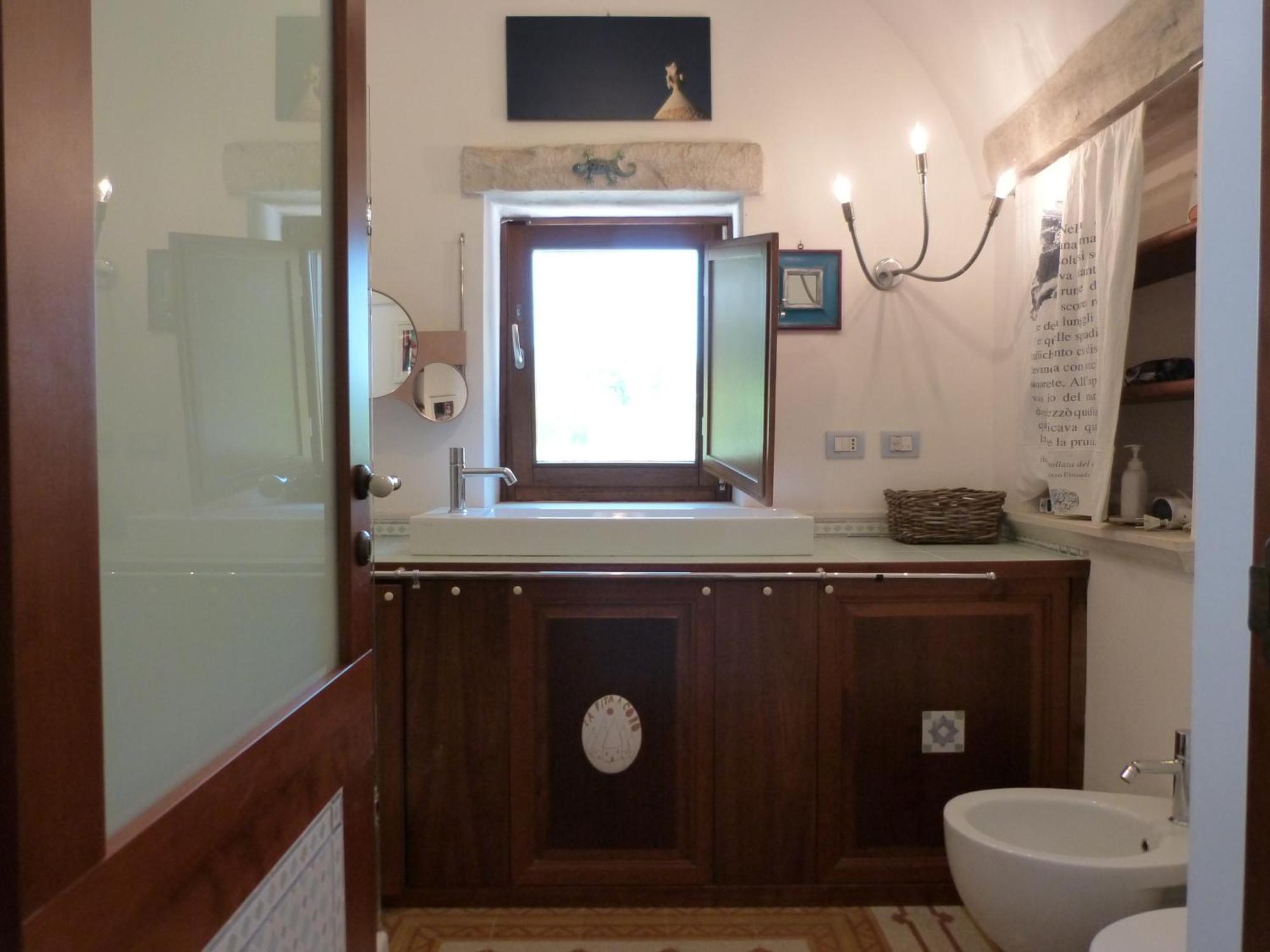 La A Cono * Cisternino